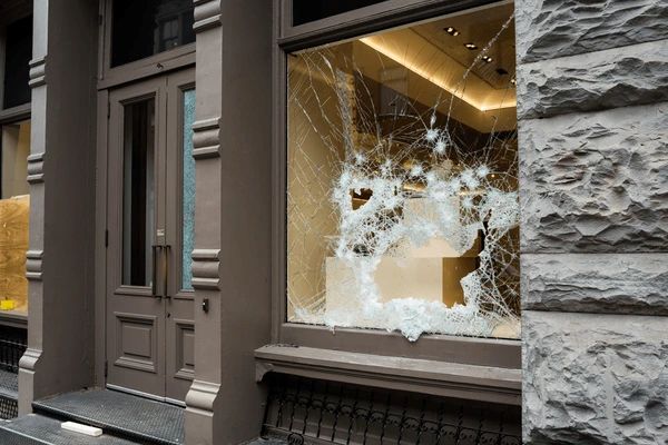 broken-store-window-by-vandals Smash and Grab Broken Window