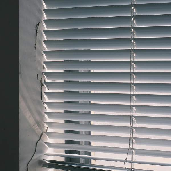 Window blinds letting heat through windows.